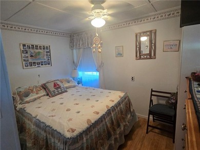 Rare 3 bed 1 bath waterfront cottage on Potter Pond!!! Located - photo 12