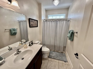 Welcome to this elegant three-bedroom, two-bathroom condominium - photo 11