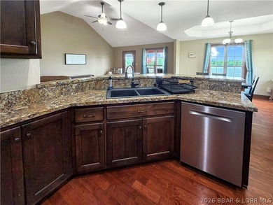 Experience lakefront living in this well-appointed 3-bedroom - photo 11
