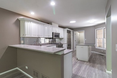 Perfectly situated just steps from the marina, boat docks, and a - photo 11
