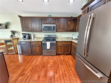 Experience lakefront living in this well-appointed 3-bedroom - photo 13