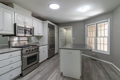 Perfectly situated just steps from the marina, boat docks, and a - photo 13