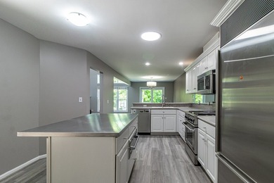 Perfectly situated just steps from the marina, boat docks, and a - photo 14