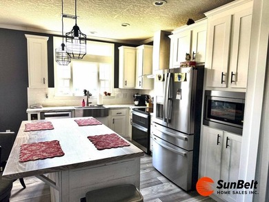 Welcome home to this beautiful 2022 manufactured home located in - photo 4