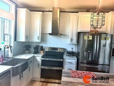 Welcome home to this beautiful 2022 manufactured home located in - photo 7