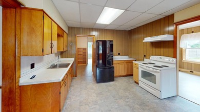 First floor living is entirely possible with this spacious cape - photo 21