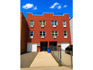 Turnkey 3-family, 3-story brick building built in 2006, offering - photo 1
