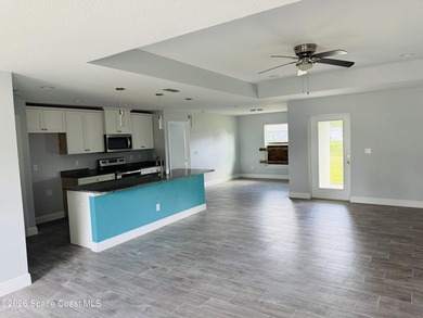 This beautifully built 2022 concrete block home sits on a - photo 4