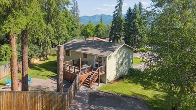 Exceptionally well-maintained 3-bedroom, 2-bathroom home tucked - photo 3