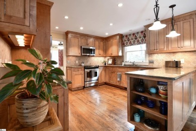 Tucked away in an exclusive gated retreat of just 57 homes