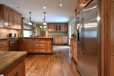 Tucked away in an exclusive gated retreat of just 57 homes