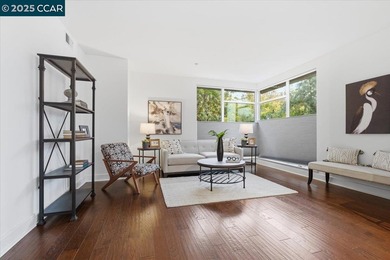 Don't miss this modern 1 bed, 1.5 bath end-unit condo in the