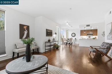 Don't miss this modern 1 bed, 1.5 bath end-unit condo in the