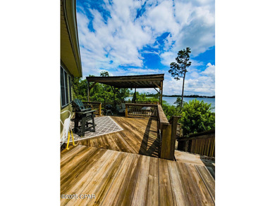 Custom-built in 2004 on 9' pilings with 4' of fill, this 2,172 - photo 19