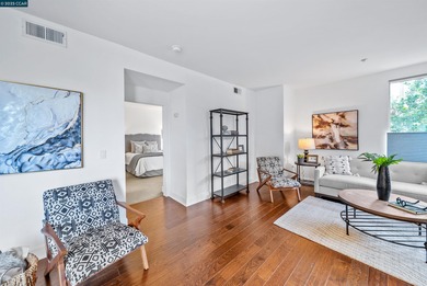 Don't miss this modern 1 bed, 1.5 bath end-unit condo in the