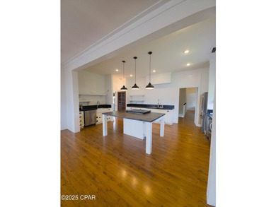 Custom-built in 2004 on 9' pilings with 4' of fill, this 2,172 - photo 28