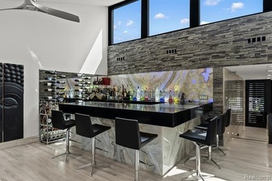A remarkable expression of contemporary lake-area living, this - photo 12