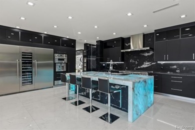 A remarkable expression of contemporary lake-area living, this - photo 17