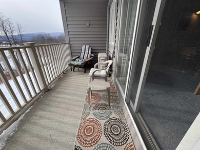 Wake up to front-row views of the South Peak ski slopes and the - photo 8