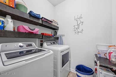 Welcome to this spacious 3-bedroom, 2.5-bath home with a 2-car - photo 27