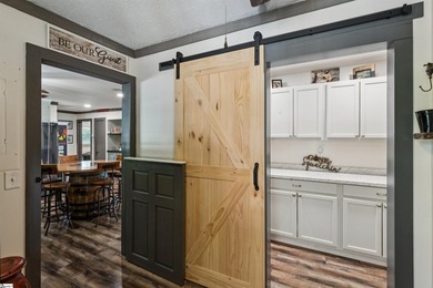 Discover a rare riverfront sanctuary at 1210 Cooper Bridge Rd in - photo 18