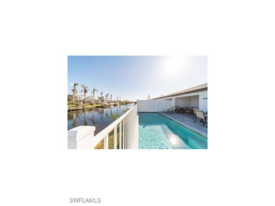 Gorgeous duplex on a Gulf Access canal! 6 bedrooms, 4 full - photo 4