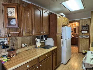 MOTIVATED SELLER - A dollhouse cottage right at the water's edge - photo 11
