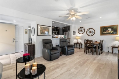 Welcome to this beautifully RENOVATED second-floor condo - photo 11