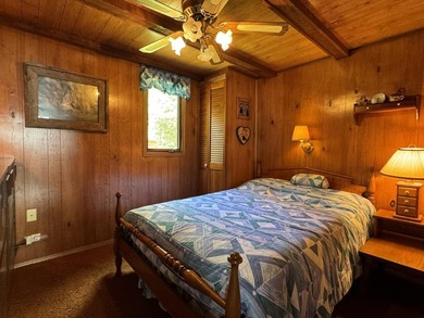 MOTIVATED SELLER - A dollhouse cottage right at the water's edge - photo 17