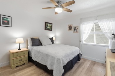 Welcome to this beautifully RENOVATED second-floor condo - photo 17