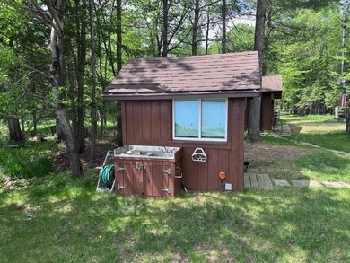 MOTIVATED SELLER - A dollhouse cottage right at the water's edge - photo 23
