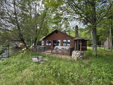MOTIVATED SELLER - A dollhouse cottage right at the water's edge - photo 29