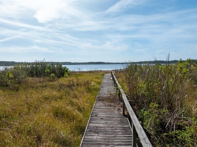 Privately positioned on Lake Mabel, this rare lakefront offering - photo 12