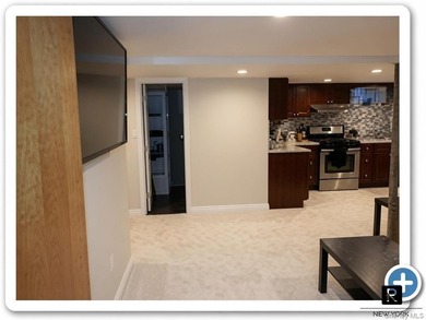 This well-maintained brick two-family home offers an exceptional - photo 15