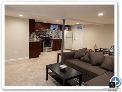 This well-maintained brick two-family home offers an exceptional - photo 16