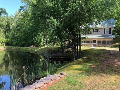 Hidden deep on 20 secluded acres of hardwoods & pine, this - photo 2