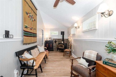 Hidden deep on 20 secluded acres of hardwoods & pine, this - photo 8