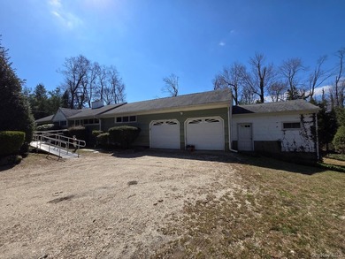 Great opportunity to live in Northport on a private 1 acre. Make - photo 1