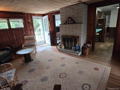Great opportunity to live in Northport on a private 1 acre. Make - photo 2