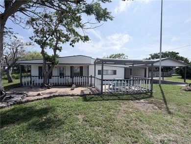 Situated on 2 lots, this beautifully maintained 2-bedroom - photo 1