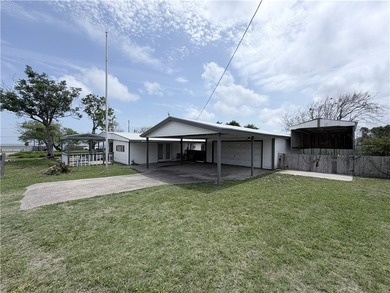 Situated on 2 lots, this beautifully maintained 2-bedroom - photo 3