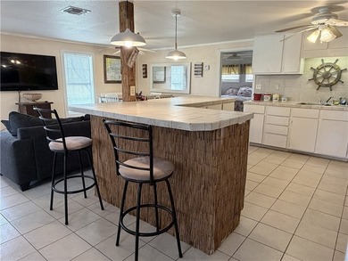 Situated on 2 lots, this beautifully maintained 2-bedroom - photo 5