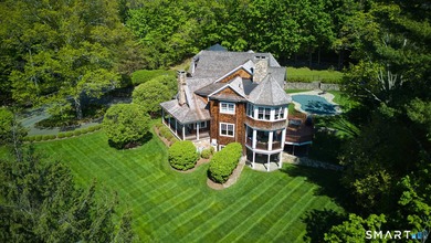 Set in one of Westport's most prestigious estate enclaves, this - photo 2