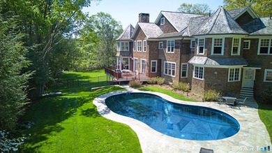 Set in one of Westport's most prestigious estate enclaves, this - photo 3