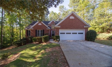 Lake Home For Sale in Flowery Branch, Georgia