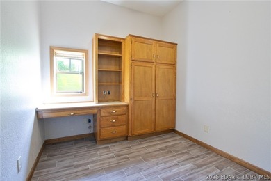 Welcome to this 3-bedroom, 2-bathroom home in Sunrise Beach, MO - photo 12