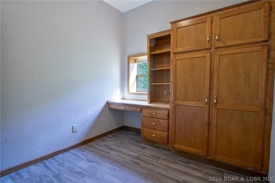 Welcome to this 3-bedroom, 2-bathroom home in Sunrise Beach, MO - photo 13