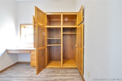 Welcome to this 3-bedroom, 2-bathroom home in Sunrise Beach, MO - photo 14