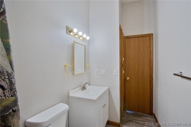 Welcome to this 3-bedroom, 2-bathroom home in Sunrise Beach, MO - photo 17