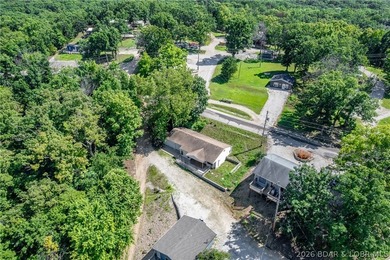 Welcome to this 3-bedroom, 2-bathroom home in Sunrise Beach, MO - photo 27